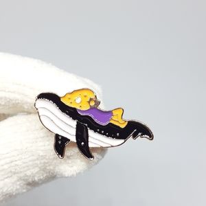 Girl on a whale enamel pin